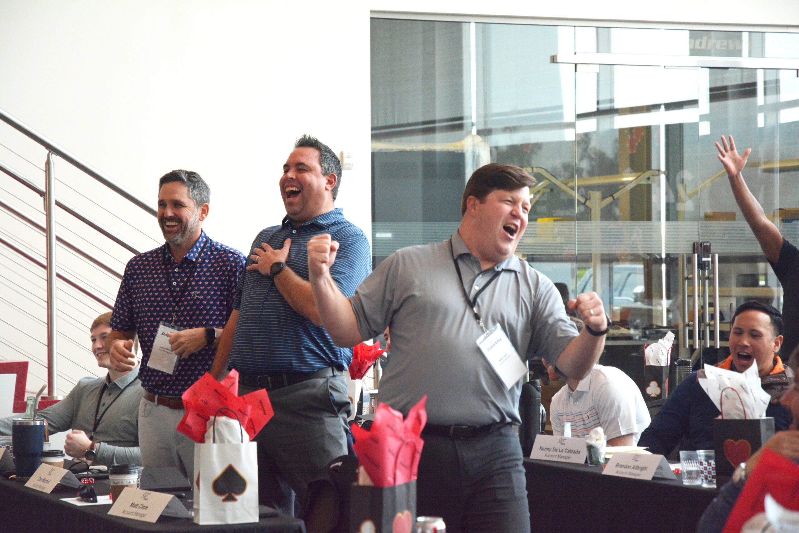 3 Participants at a previous SKO cheering and having fun