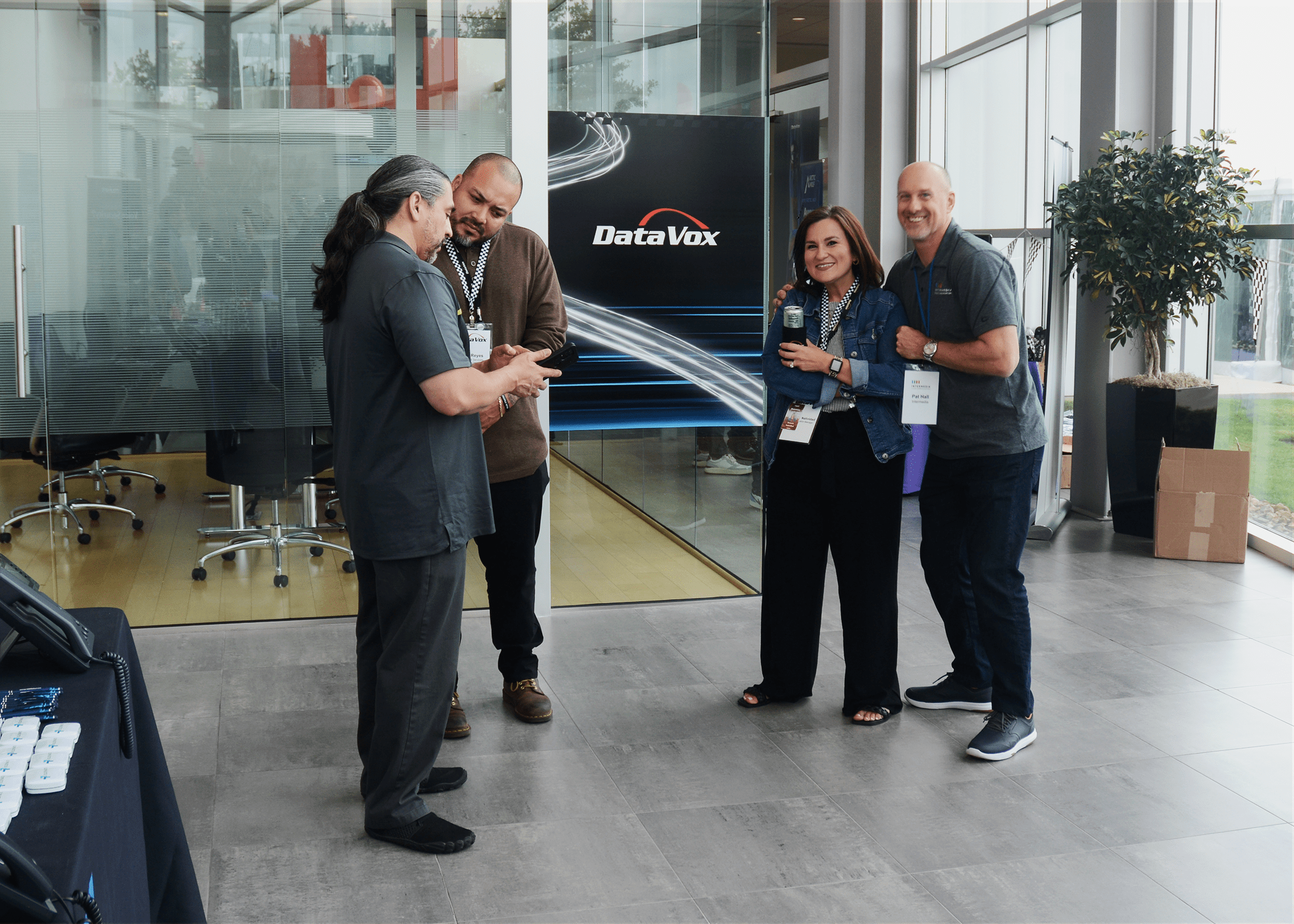 Elevate representatives speaking to DataVox team members.