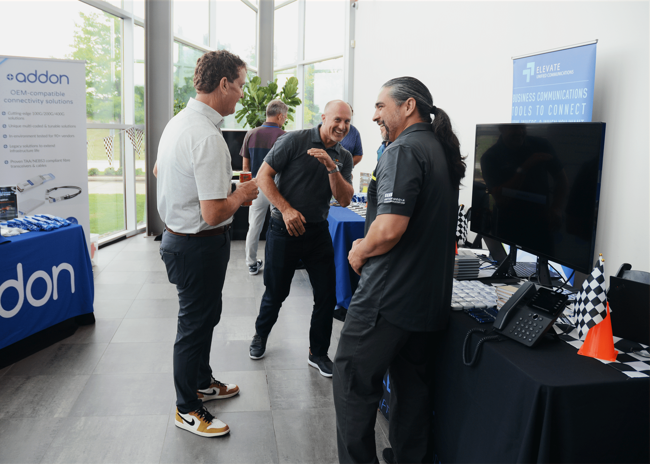 Elevate representatives speaking to DataVox executive.